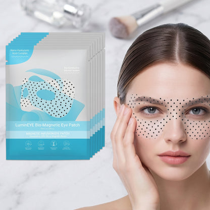 Woman with eye patches and LuminEYE Bio-Magnetic Eye Patch packaging on a marble background